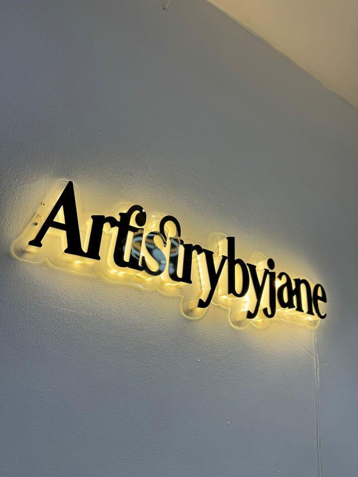 Artistry by Jane backlit letters