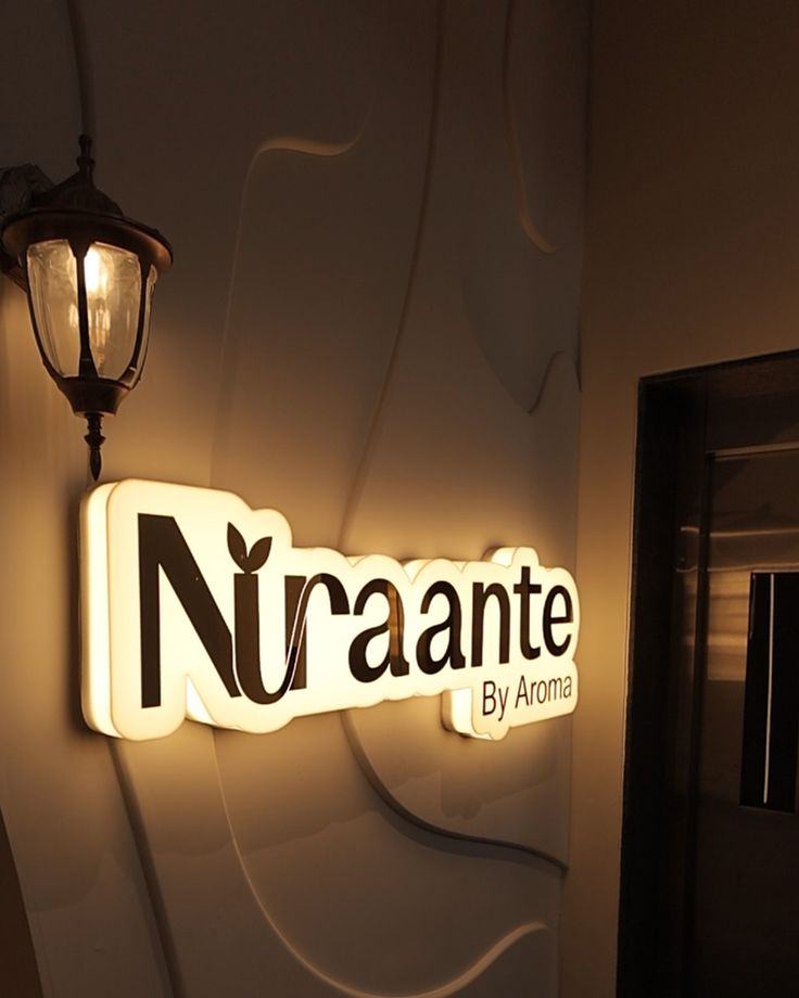 Niraante by Aroma illuminated sign